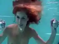 Sexy underwater redhead Nikita Vodorezova