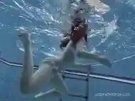 White swimsuit with tattoos babe Roxalana Cheh underwater