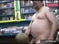 Woman randomly sucks a dirty video store clerk